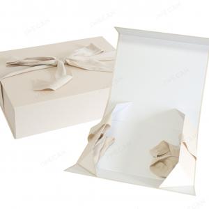 Outside ribbon bow foldable box